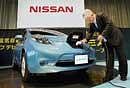 Nissan Motor Co chief vehicle engineer Hidetoshi Kadota with the company's zero-emission electric car, Leaf, in Yokohama, Japan, on Friday. AP