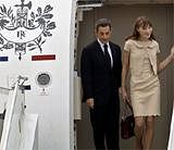 French President Nicolas Sarkozy and first lady Carla Bruni Sarkozy disembark from their plane upon arrival in Bangalore on Saturday. AP