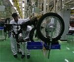 Employees work at Hero Honda's plant in Haridwar. Reuters File Photo