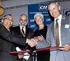 Left to Right: CII Director General Chandrajit Banerjee, CII President Hari Bhartia, French Minister of Economic Affairs, Industry and Employment Christine Lagarde and Chairman of France-India Businessmen Council, MEDEF Guy De Panafieu, during the signing of MoU between Confederation of Indian Industry (CII) and The Mouvement Des Enterprises De France International (MEDEFI), in Mumbai on Tuesday. PTI