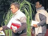 Former Telecommunications Minister A Raja (R) during a CBI raid at his residence in New Delhi on Wednesday. PTI