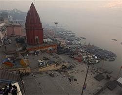 Furniture and debris are scattered on Wednesdayover the Sheetla Ghat, one of many stone staircases leading to the Ganges river, where a bomb stashed in a milk container exploded Tuesday, AP