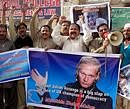 Protesters rally to condemn the arrest of WikiLeaks founder Julian Assange during a protest in Multan, Pakistan, on Thursday. AP