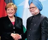 Prime Minister Manmohan Singh with German Chancellor Angela Merkel after a joint press conference in Berlin. PTI