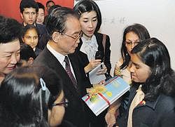 Chinese Premier Wen Jiabao interacting with school kids in New Delhi. PTI