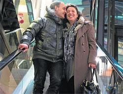 GOING STRONG: Thierry Galissant and Sophie Lazzaro, who are together in a civil union, walk to go Christmas shopping in Paris. NYT