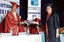 PROUD A student receiving degree certificate from the chief guest.