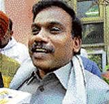 Former telecom minister  A Raja talks to the media  outside the investigating agency's headquarters in New Delhi on Saturday. PTI