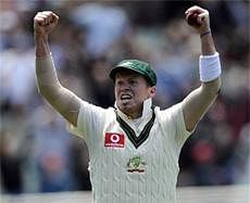Australia's Peter Siddle celebrates catching out England's Ian Bell during the second day of the fourth Ashes cricket test match at the Melbourne Cricket Ground, Australia.  AP Photo