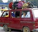 SAD SIGHT A Maruti van overloaded with children. DH Photo by Janardhan B K