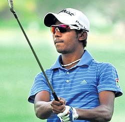 S Chikkarangappa plays a shot during his two-over par third round on Wednesday. DH photo