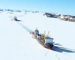 A ship carrying  heavy equipment in the Antarctica.