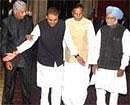 Prime Minister Manmohan Singh with newly sworn-in ministers, left to right, Sri Prakash Jaiswal, Praful Patel and Beni Prasad Verma at the Rashtrapati Bhavan in New Delhi on Wednesday. PTI Photo