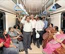 Pride ride: BMRCL Managing Director Sivasailam and other invited guests travel in the much awaited Namma Metro on Sunday evening. DH Photo