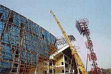 Burning the Midnight Oil: With the ICC delegates visit scheduled for Tuesday, construction  activity can still be seen going on at the famous Eden Garden stadium in Kolkata.