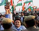 Policemen stop BJP activists from crossing the Jammu and Kashmir-Punjab border during the party's "Rashtriya Ekta Yatra" at Madhavpur on Tuesday. PTI