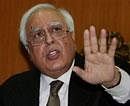 Union Minister for Communication & IT Kapil Sibal makes an statement regarding the policy to be followed in respect of spectrum assignment & pricing, during a press conference in New Delhi on Saturday. PTI