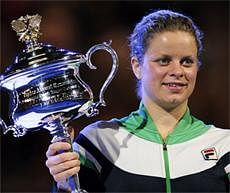Belgium's Kim Clijsters holds the trophy after beating China's Li Na during the women's singles final at the Australian Open tennis championships in Melbourne, Australia on Saturday. AP