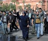 Egyptian protesters march at Tahrir Square in Cairo on  Sunday. AFP