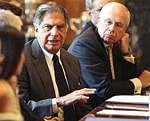 Ratan Tata, centre, CEO of TATA speaks during a meeting of the 'UK-India CEO Forum, chaired by British Prime Minister David Cameron, unseen, at 10 Downing Street, in London on Thursday. AP