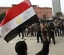 Anti-government protesters pray in Tahrir Square, Cairo, Egypt on Saturday. AP