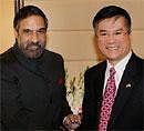 Union Minister for Commerce and Industry, Anand Sharma shakes hands with US Commerce Secretary Gary Locke during a meeting at Udyog Bhawan in New Delhi on Monday. PTI