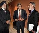 External Affairs Minister SM Krishna (center) and his counterpart Antonio de Aguiar Patriota (right) from Brazil and Ambassador Hardeep singh Puri during a meeting with members of L69 group in New York on Thursday. PTI Photo