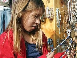 Two-thirds of girls cautioned for shoplifting in Britain are fromaffluent families.