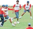 enjoying Indian cricketers playing football.  dh photo by Srikanta Sharma R