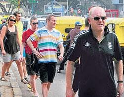 English fans walk near the Chinnaswamy stadium in Bangalore on Saturday.  DH Photo/ Kishor Kumar Bolar