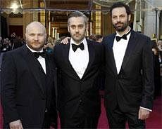 Iain Canning (C), Emile Sherman (R) and Gareth Unwin, producers of ''The King's Speech,'' nominated for best picture, arrive at the 83rd Academy Awards in Hollywood, California, February 27, 2011.Reuters