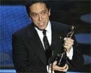 Lee Unkrich accepts the Oscar for best animated feature film for ''Toy Story 3'' at the 83rd Academy Awards on Sunday . AP