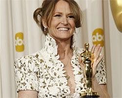 Melissa Leo poses backstage with the Oscar for best actress in a supporting role for ''The Fighter'' at the 83rd Academy Awards on Sunday in the Hollywood section of Los Angeles. AP