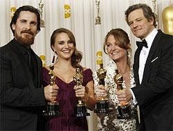 Christian Bale, left, best supporting actor, Natalie Portman, best actress, second from left, Melissa Leo, second from right, best supporting actress, and Colin Firth, best actor, pose backstage with their Oscars at the 83rd Academy Awards on Sunday. AP