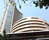 Sensex ends moderately higher in volatile trade