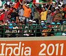 India's cricket fans during the Cricket World Cup 2011 match against Netherlands in New Delhi on Wednesday. PTI