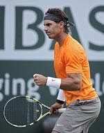 Rafael Nadal, of Spain, celebrates after winning a game against Ryan Sweeting, of the United States, at the BNP Paribas Open tennis tournament, Monday, March 14, 2011, in Indian Wells, Calif. AP