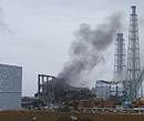 Smoke is seen coming from the area of the No. 3 reactor of the Fukushima Daiichi nuclear power plant in Tomioka, Fukushima Prefecture in northeastern Japan, on Monday. Reuters