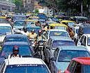 long way Traffic piled up on MG Road as there is no right turn at Anil Kumble Circle.  DH photo/ Dinesh s k