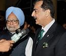 Pakistan PM Yousuf Raza Gilani and Indian PM Manmohan Singh - PTI Photo