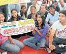 with anna: Students demonstrate (left) and form a human chain at the Freedom Park on Friday to support Anna Hazares demand to legislate the Jan Lokpal Bill. dh Photos