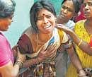 Bhagya is inconsolable after her children Bharath and Sharath died in a fire on Friday. DH Photo/M S Manjunath