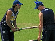 Deccan Chargers' Kumara Sangakkara (L) and Dale Steyn during a training session. PTI