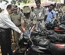 Police Commissioner Shankar Bidari inspecting the police recoverd property display by west division at Central college ground in Bangalore on Wednesday. DHNS photo