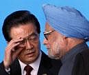 Prime Minister Manmohan Singh with Chinese President Hu Jintao during a joint declaration at the one-day BRICS summit in Sanya, China on Thursday. PTI Photo