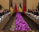 Ukraine's Prime Minister Mykola Azarov, fourth from left, holds a bilateral meeting with Hu Jintao, fourth from right, China's president, in Sanya, Hainan province, China, on Thursday, April 14, 2011. AP