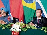 Prime Minister Manmohan Singh with Russian President Dmitry Medvedev briefing  reporters at the BRICS summit in Sanya, China, on Thursday. AP