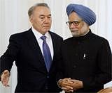Kazakh President Nursultan Nazarbayev (L) welcomes Indian Prime Minister Manmohan Singh to start their talks in Astana, on April 16, 2011. AFP