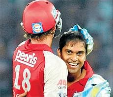 Talismanic: Kings XI Punjabs Paul Valthaty (right) celebrates with his skipper AdamGilchrist after dismissing a Deccan Chargers wicket in Hyderabad on Saturday. AFP