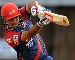 Delhi Daredevils batsman Virender Sehwag plays a shot during the IPL Twenty20 match between Pune Warriors and Delhi Daredevils at The D.Y. Patil Cricket stadium in the outskirts of Mumbai on Sunday. AFP